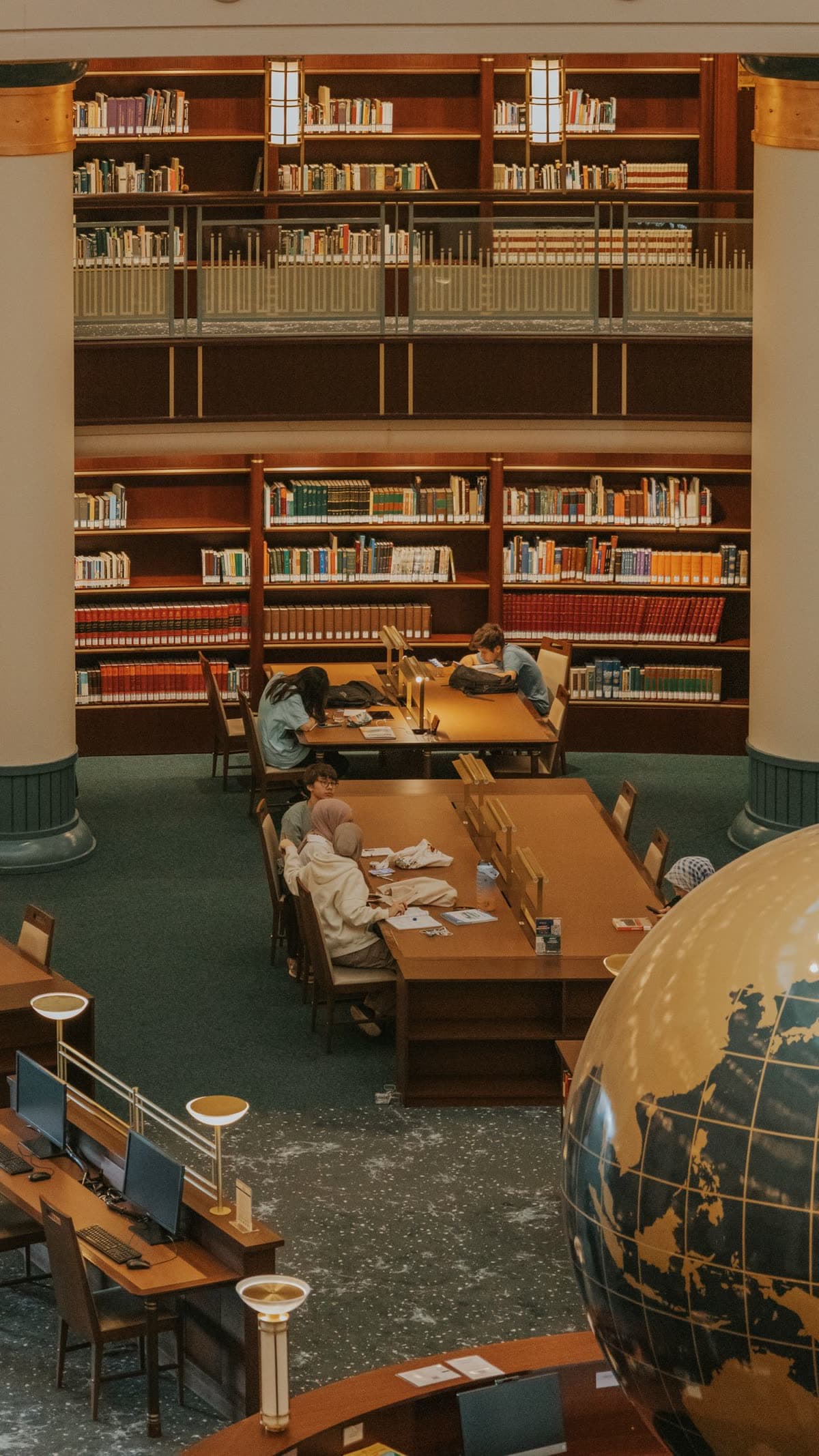 A scholar reading in an academic library